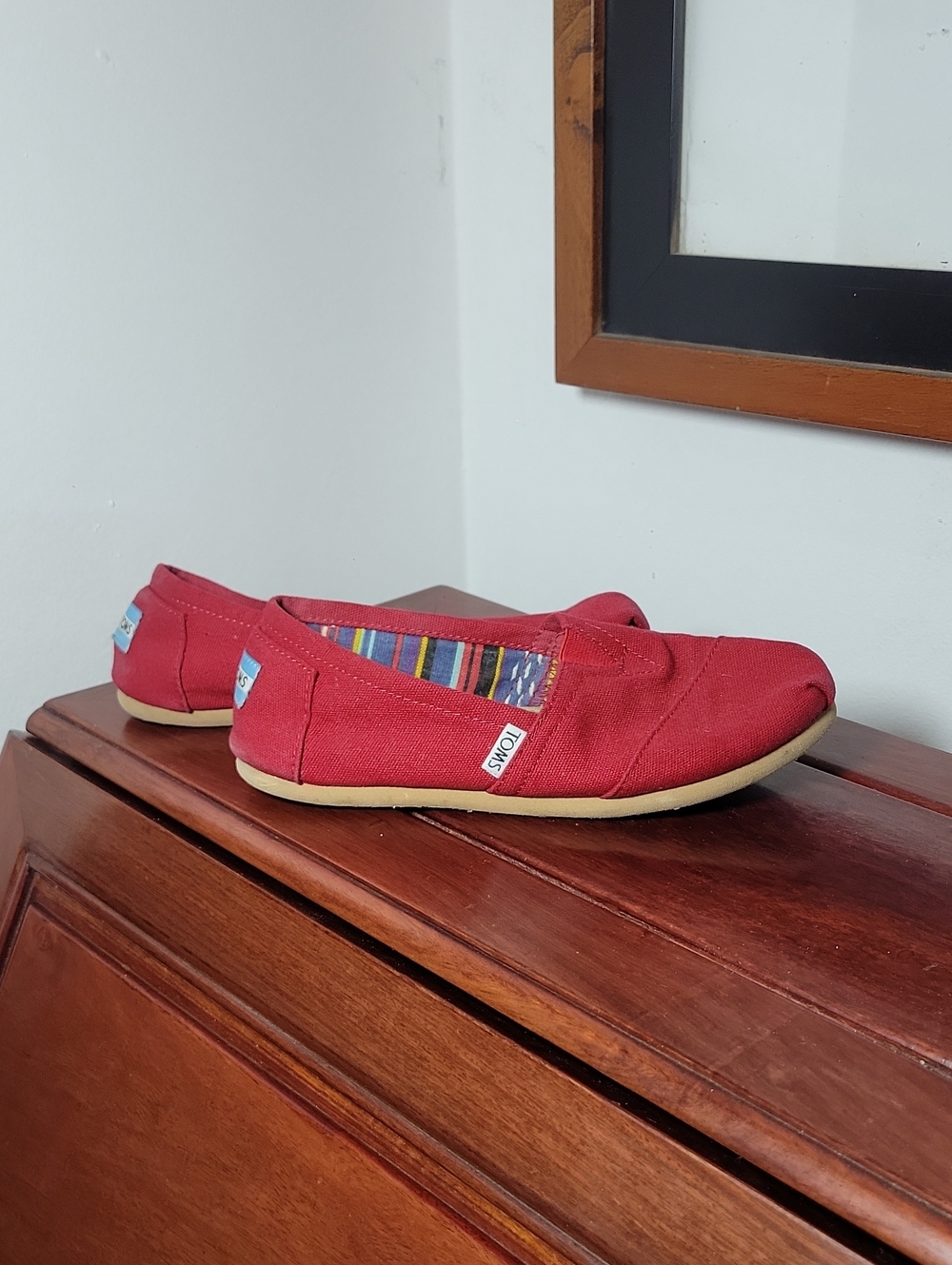 Toms Women’s Classic Canvas Slip-Ons in Red